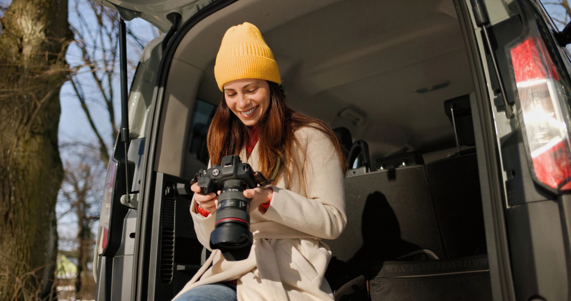 Travel creator with camera preparing for an adventure